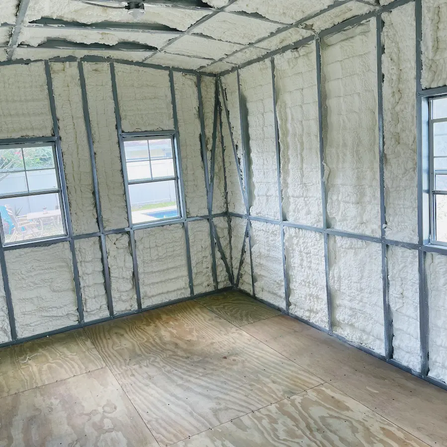 Closed-cell spray foam insulation applied to wall cavities in a residential project in Semmes